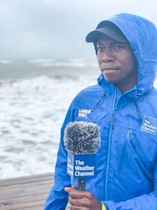 Tevin Wooten covering a storm for the Weather Channel