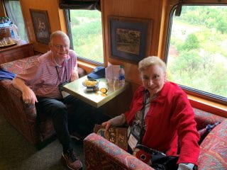 Carolyn and Jurgen Schnepel enjoying their snacks aboard the Verde Canyon Railway.